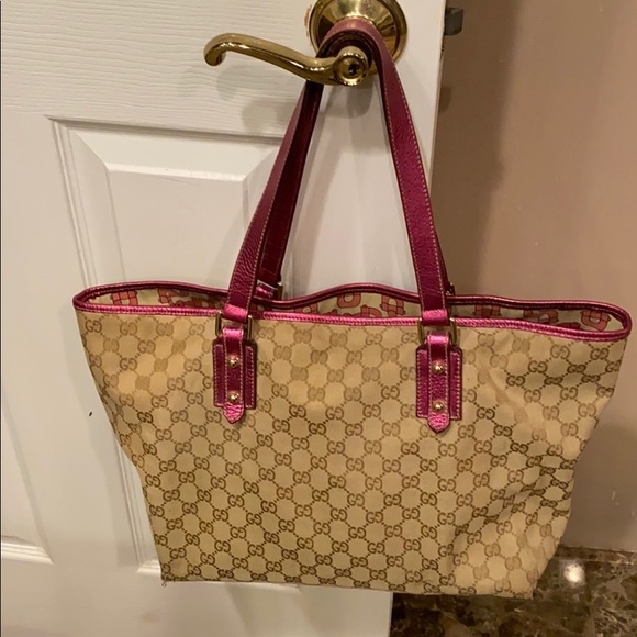 Gucci Handbags - Authentic Monogram Gucci bag w/ metallic pink trim